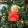 Jolly Red Pom Pom Basket Holiday Ornament -Jungalow Lifestyle OO.20139 8b54c891 dc11 497a 99de eb027442e43f 1800x1800 PhotoRoom