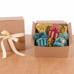 Blue Patterned Pom Pom Basket Holiday Ornament -Jungalow Lifestyle OO.20142OO.20146OO.20148 1800x1800 PhotoRoom 8e8bef72 b9e6 4930 94a7 2e6b48cffa85